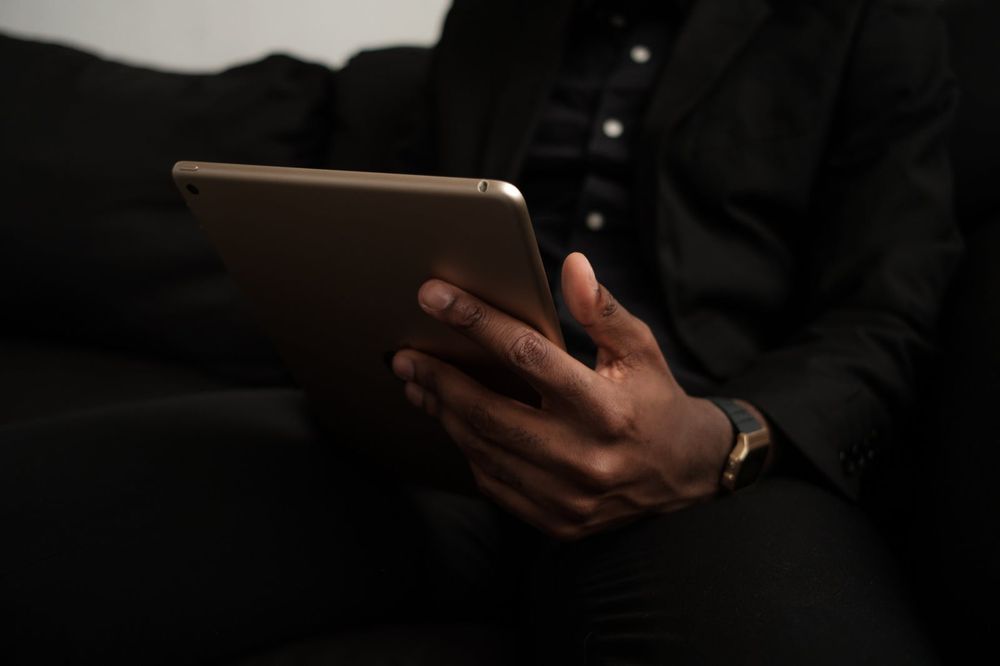 An executive reviewing research findings on a tablet